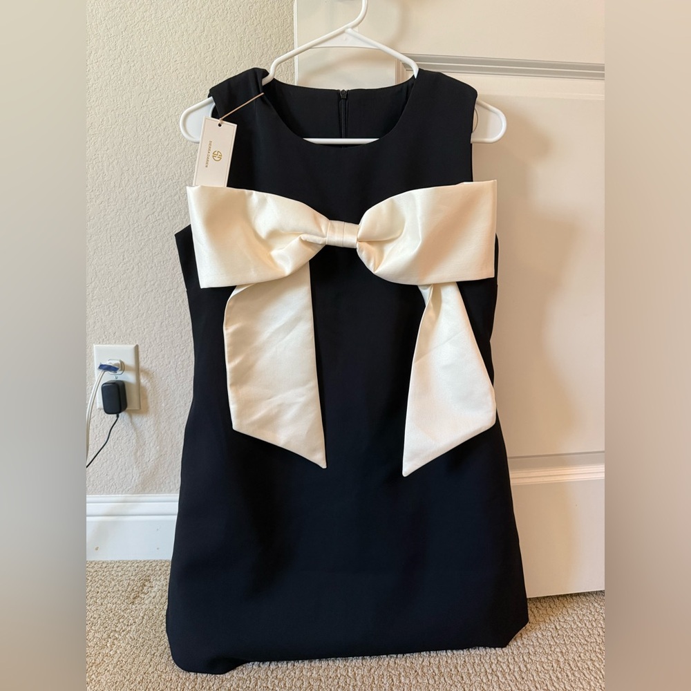 Elegant Black and Cream Dress with Bow